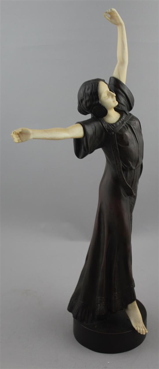 Peter Tereszczuk (Austrian, 1875-1963). A patinated bronze and ivory figure of a young lady dancing, 16.75in.